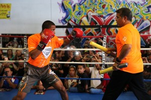 KISSIMMEE, FL - OCTOBER 05: Puerto Rican boxer Felix Verdejo (L) and his trainer Ricky Marquez are seen in the ring as they train during a media workout event at the Kissimmee Boxing Gym on October 4, 2015 in Kissimmee, Florida. Verdejo is returning from a hand injury and announced his next fight will take place in Kissimmee on October 31. (Photo by Alex Menendez/Getty Images)